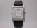 Front view of Rotary Revelation watch with white dial, black Roman numeral indices, and date window.