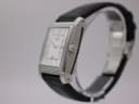 Angled view of Rotary Revelation watch showing white dial and textured case side.