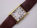 Close-up front view of the Raymond Weil rectangular white dial with black Roman numerals and small minute track.
