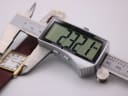 Digital caliper measuring the case width of the Raymond Weil watch, displaying 22.1mm.