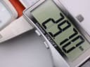 Digital caliper showing the watch case diameter measurement of 28.1mm.