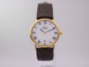 Front view of Raymond Weil gold-plated quartz watch with white Roman numeral dial and brown leather strap.