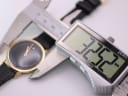 Digital caliper measuring the watch case diameter at 32.52mm.