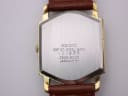 Close-up of the Seiko watch stainless steel case back with serial number 130988 and model 2628-5030 engraving.