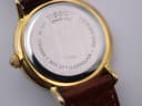 Close-up of the stainless steel case back, revealing engravings like 'TISSOT SINCE 1853', 'WATERRESISTANT 30M', 'MINERAL GLASS', and 'T860K'.