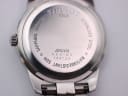 Close-up of the Tissot PR 50 case back showing model number J376/476, serial number, "Sapphire Crystal", "Stainless Steel", and "Water Resistant 50M" engravings.