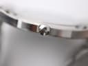 Detailed close-up of the watch's knurled crown.