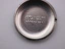 Inside of the case back, showing 'STAINLESS STEEL BACK SWISS MADE RAYMOND WEIL' engraving.