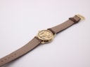 Back view of the full Accurist watch, showing the underside of the brown leather strap and buckle.