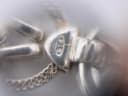 Extreme close-up of the clasp, showing a '925' sterling silver hallmark