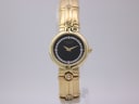 Front view of gold tone Raymond Weil watch with black diamond-set dial and integrated bracelet.