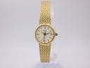 Front view of the Rotary LB5004 ladies watch, showing the cream dial, gold-tone baton markers, and mesh bracelet.