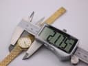 Digital caliper measuring the case diameter of the Rotary watch, displaying 21.75mm.
