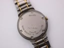 Close-up of the watch's case back, clearly showing "SEIKO", "WATER RESISTANT", "TITANIUM", serial number 741445, and model 7N82-0420.