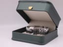 The Maurice Lacroix watch displayed in a generic green leatherette presentation box (studio prop).