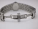 View of the hidden butterfly clasp on the stainless steel integrated bracelet, with textured inner surfaces.