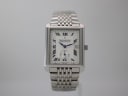 Front view of the Dreyfuss & Co. Series 1974 rectangular watch with silver dial and steel bracelet on a grey background.