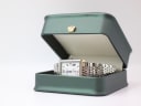 Dreyfuss & Co. watch presented in a green leatherette display box with a gold crown emblem.