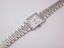 Overhead view of the complete Dreyfuss & Co. Series 1974 watch and steel bracelet laid flat.