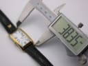 Digital caliper measuring the lug-to-lug length of the watch case at 38.35mm.