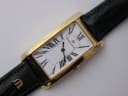 Close-up, slightly angled view of the Maurice Lacroix dial with Roman numerals and gold-plated case.