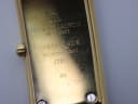 Close-up of the gold-plated case back, showing "Maurice Lacroix Swiss Made Goldplated G10 Z Waterresistant 47812 486" engravings.