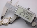 Digital caliper measuring the case diameter of the watch as 24.90mm.