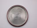 Interior of the Tissot Seastar case back, engraved with 'TISSOT LE LOCLE', 'ACIER INOXYDABLE', and serial number 'N 351'.