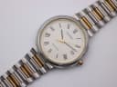 Top-down, slightly angled view of the Tissot Seastar, showcasing the dial and full two-tone bracelet.