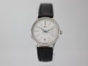 Front view of the XEN XQ 0030 watch with a white dial, silver case, and black leather strap.