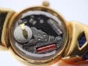 Macro shot of the quartz movement inside the watch, revealing "FRANCE ESAUCHES", "ONE JEWEL", and "RENATA 377 SWISS MADE" battery.
