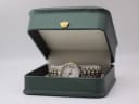 Certina watch presented in a generic green leatherette display box with a gold crown emblem.