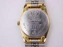 Detailed view of the stainless steel case back, revealing 'BEV NEIL' engraving and 'SEIKO WATER RESISTANT 460120 JAPAN-G SGP ST. STEEL BACK 2A23-0020' markings.