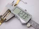 Side perspective view of the Seiko watch, focusing on the rectangular case profile and acrylic crystal.