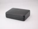 Closed view of the black textured exterior of the "Leslie Davis" presentation box.