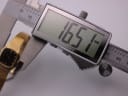 Digital caliper measuring the case diameter of the Seiko watch, displaying a precise reading of 16.51mm.