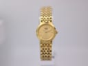 Front view of the gold tone Seiko V400-0368 watch with a gold dial and matching multi-link bracelet.