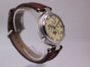 Another angled side view of the Stauer watch, highlighting the case profile and strap attachment.