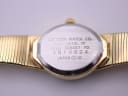 Macro shot of the watch case back engraving, showing 'CITIZEN WATCH CO. BASE METAL YP 3220-326407 YO 3010824 JAPAN ➡10'.
