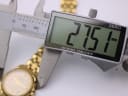 Digital caliper measuring the case diameter of the Tissot Ballade watch, displaying an exact measurement of 27.5mm.
