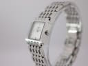 Side profile view of the Tissot L910 watch, showing the crown and brushed finish of the case.