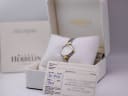 Michel Herbelin 17025 watch in its original white presentation box with accompanying papers, showing the date of sale.