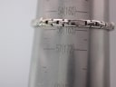 The watch bracelet on a wrist sizing cone, indicating a wrist circumference of approximately 165mm or 16.5cm.