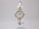 Front view of the Michel Herbelin 17025 two-tone ladies' quartz watch with white dial and gold-tone accents on a display stand.