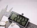 Digital caliper measuring the case diameter of the Michel Herbelin watch, displaying a precise reading of 22.32mm.