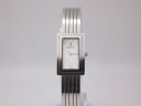 Front view of Michel Herbelin ladies watch with rectangular silver case and white mother-of-pearl dial.