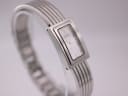 Angled side view of the Michel Herbelin watch, highlighting the case profile and bracelet design.