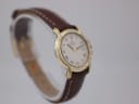 Another angled side view of the Raymond Weil watch, highlighting the case profile and brown leather strap.