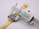 Digital caliper measuring the Raymond Weil watch case, showing 26.92mm diameter.