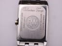 Close-up of the stainless steel case back with engravings for 'Collection Tango', 'Sapphire Crystal', '5ATM Water Resistant', 'Swiss Made', and model number '5971'.